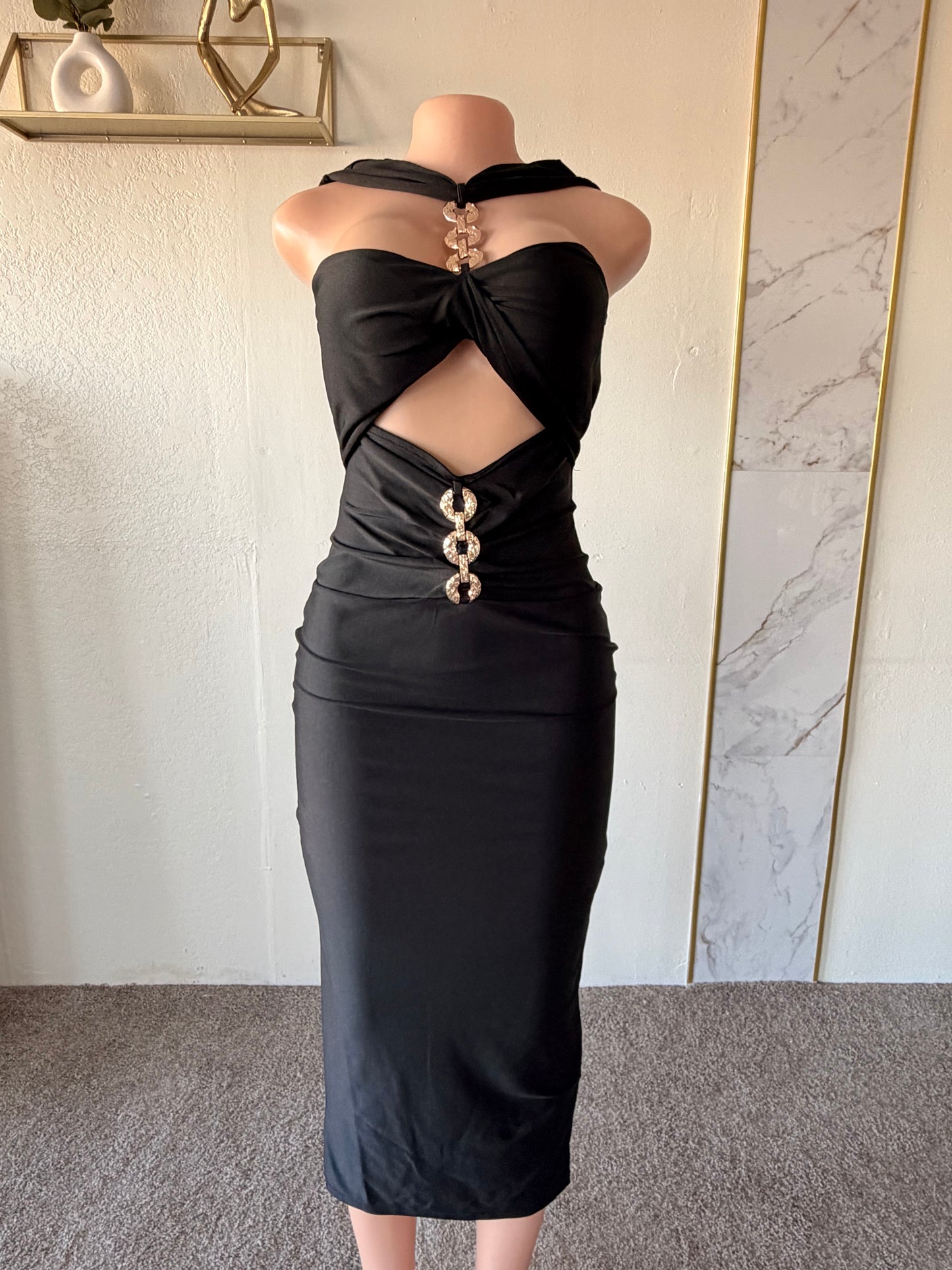 Black dress with front jewelry